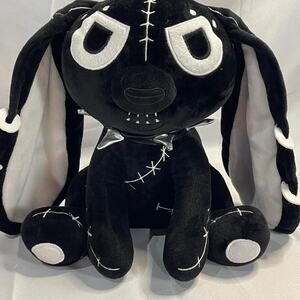 Black and white plush toy